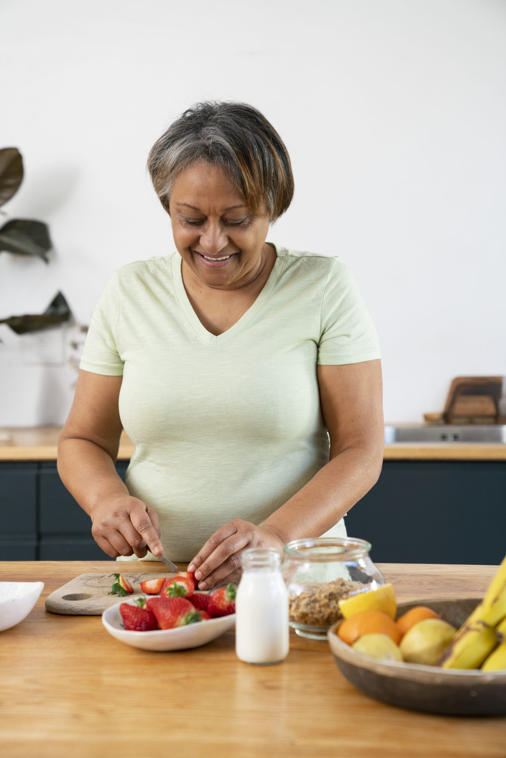 front-view-woman-cooking-home